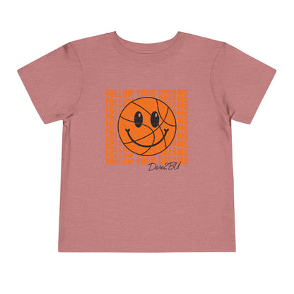 Toddler Tee — 'Follow Your Dreams' Smiley Basketball Graphic