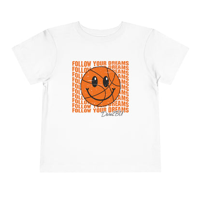 Toddler Tee — 'Follow Your Dreams' Smiley Basketball Graphic